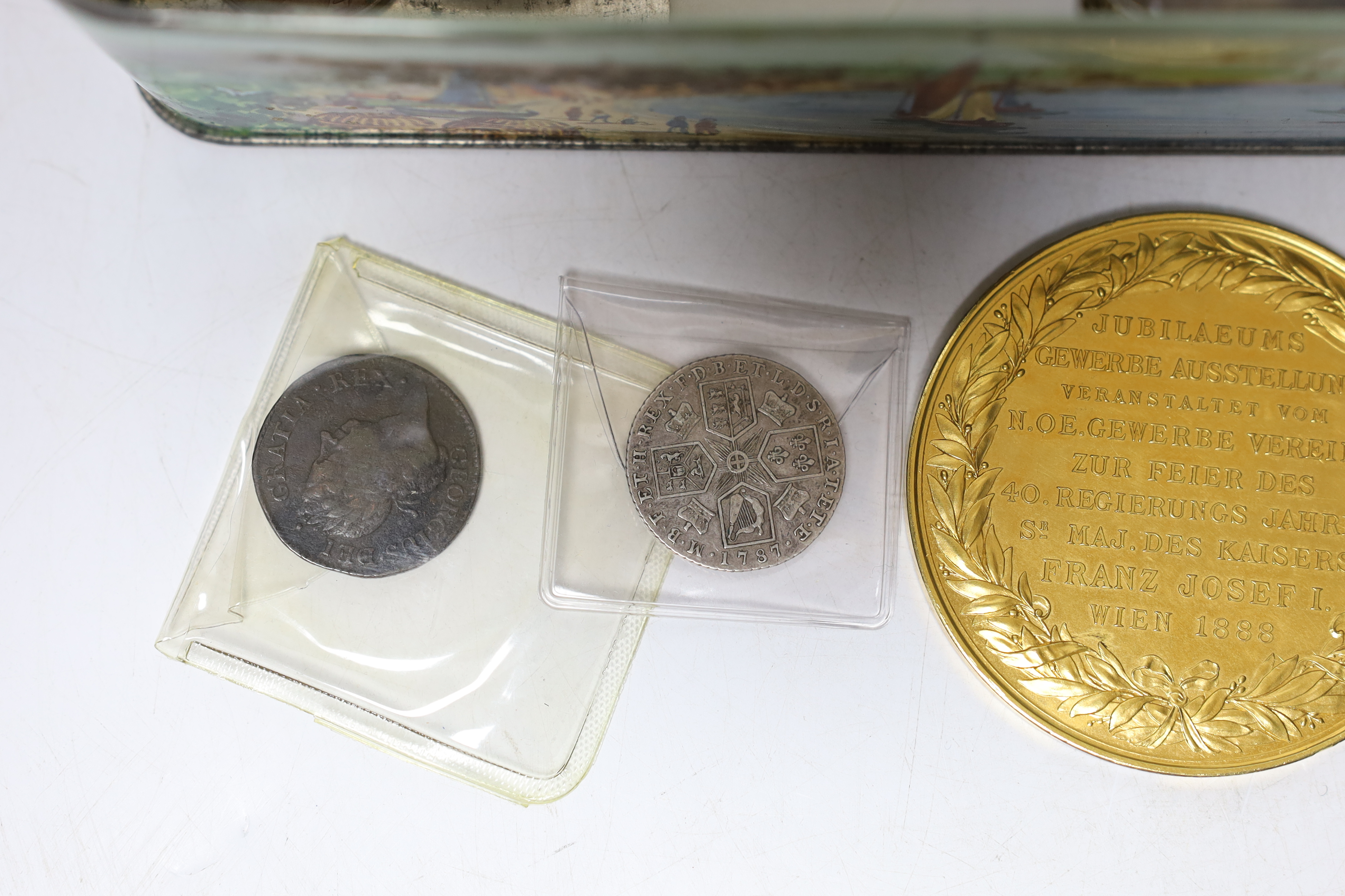 A collection of British coins including Charles II four pence 1680, William III shilling 1696, George III shilling 1787, various pennies, commemorative medals including Franz Joseph I 40th anniversary of his reign